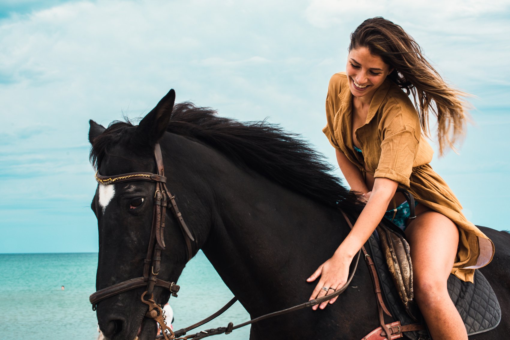 Woman Riding a Horse