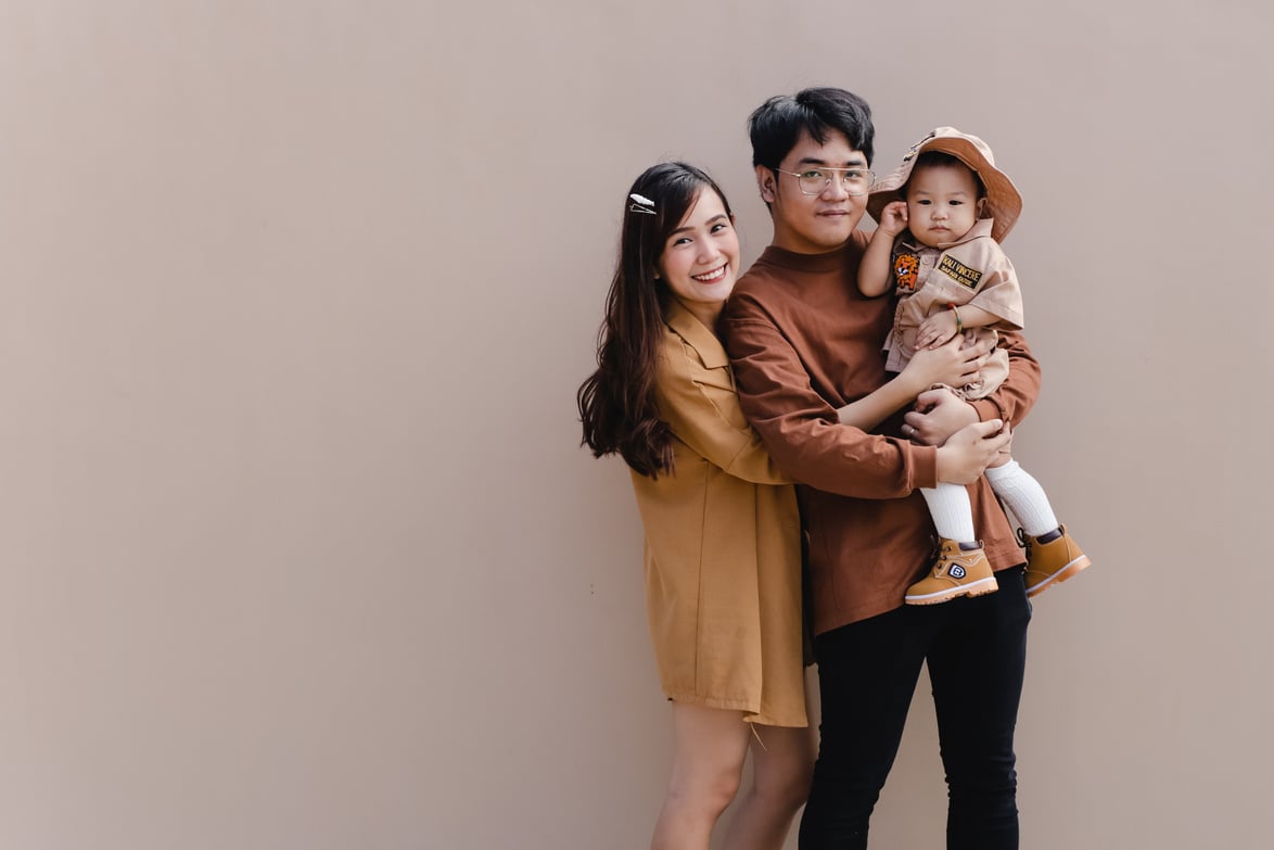 Family Wearing Brown Clothing Outdoors