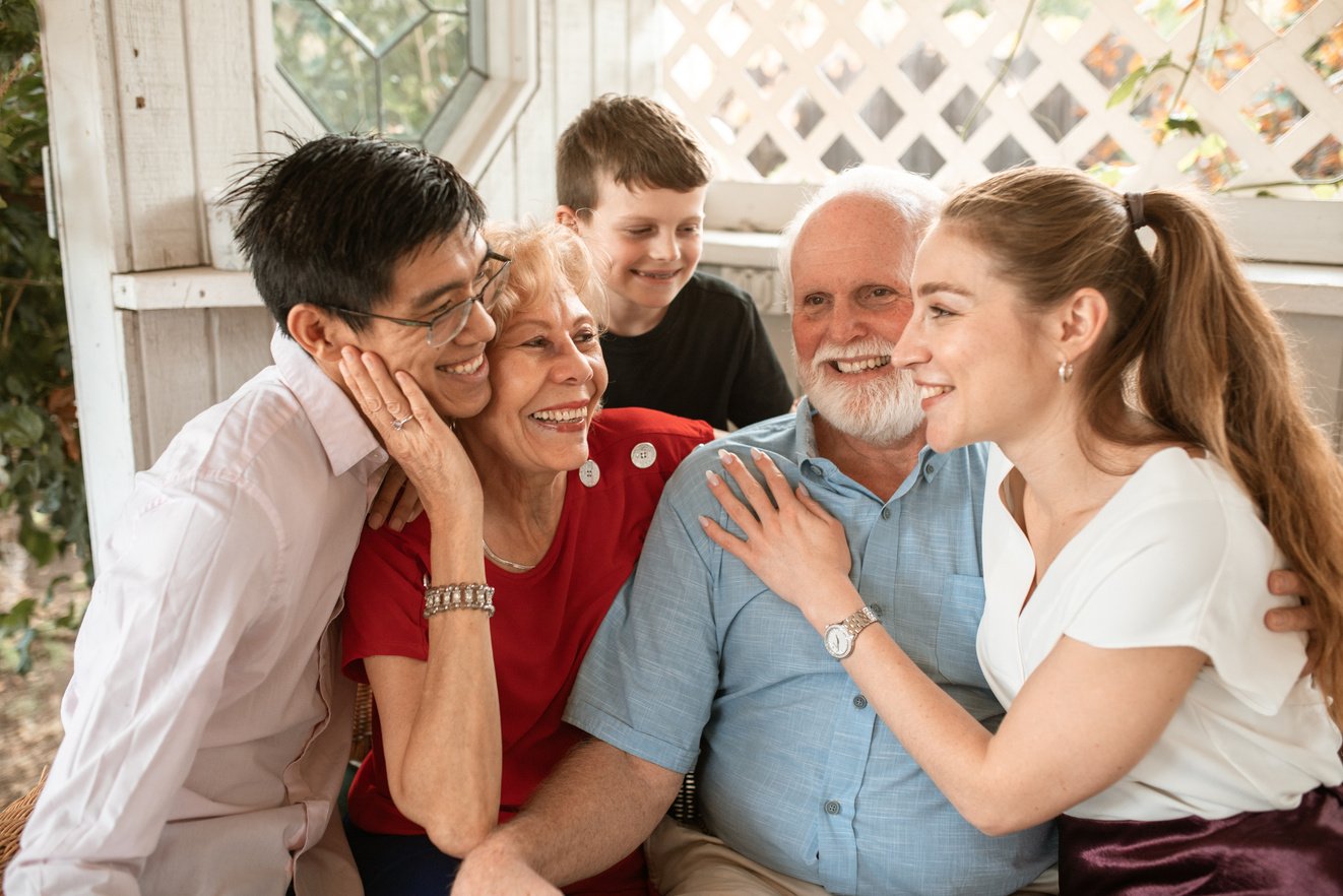 Happy Family Sitting on a Couch 