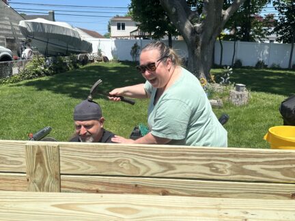 Being silly while building the garden bed